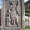 Horní Slavkov - sloup se sousoším Nejsvětější Trojice | figurální reliéf sv. Floriána na levé straně podstavce - květen 2012