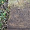 Lažany - Michlův kříž | dochovaný německý věnovací nápis na rozvaleném podstavci Michlova kříže - duben 2016