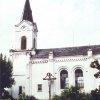 Žlutice - kostel Nejsvětější Trojice | jižní průčelí hřbitovního kostela po polovině 20. století