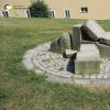 Teplá - pomník obětem 1. světové války | uspořádané fragmenty demolovaného pomníku obětem 1. světové války v parku u farního kostela v Teplé - červen 2017