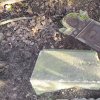 Německý Chloumek - kamenný kříž | rozvalený podstavec kamenného kříže v polích u Německého Chloumku - březen 2017
