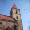 Velichov - kostel Nanebevzetí Panny Marie | zvonová věž v průčelí kostela - březen 2013