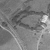 Těšetice - Romeský mlýn | areál Romeského mlýna s ještě zastřešenými objekty na snímku vojenského leteckého mapování z roku 1952