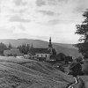 Doupov - kostel Nanebevzetí Panny Marie | farní kostel v Doupově od jihu na historickém snímku z roku 1920