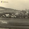 Tureč - kostel sv. Jiří | ves Tureč (Turtsch) s farním kostelem sv. Jiří od jihovýchodu na historické pohlednici z doby před rokem 1945