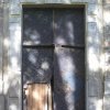 Skoky - poutní kostel Navštívení Panny Marie | poškozená železná vrata hlavního vchodu do kostela - říjen 2010