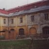 Ostrov - piaristický klášter | zchátralý objekt kláštera z rajské zahrady - duben 2002