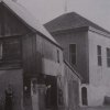 Chyše - židovská synagoga | synagoga při pohledu z ghetta v době před rokem 1945